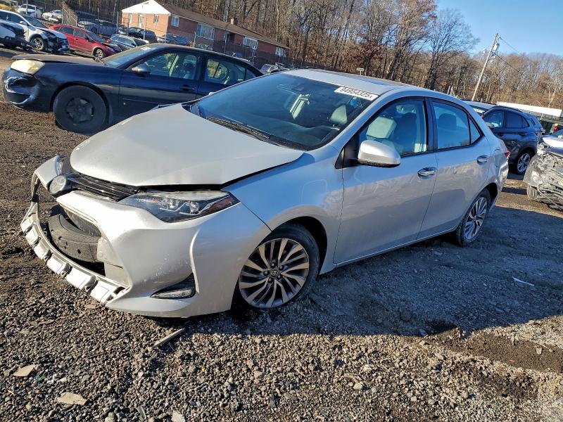 TOYOTA COROLLA L 2018 with VIN 2T1BURHEXJC085101 - Photo from auction