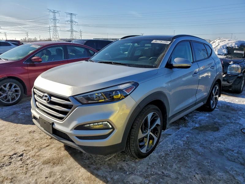 HYUNDAI TUCSON VAL 2018 with VIN KM8J3CA2XJU737760 - Photo from auction