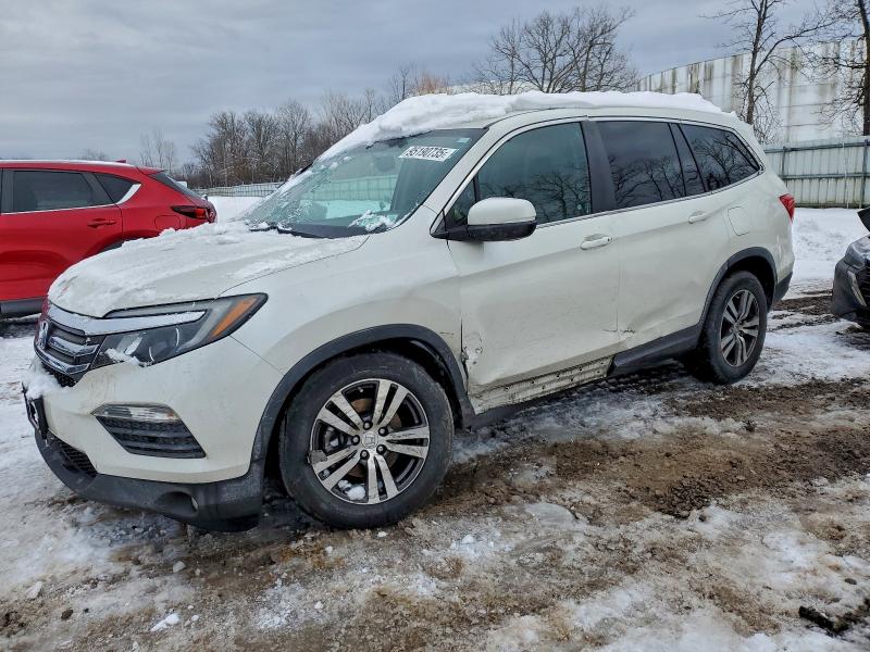 HONDA PILOT EXL 2017 with VIN 5FNYF6H50HB026356 - Photo from auction