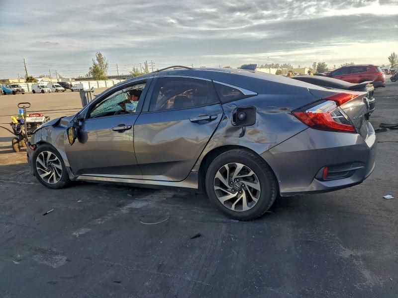 Photo 2 from auction – 2018 HONDA CIVIC with VIN 19XFC2F78JE024573