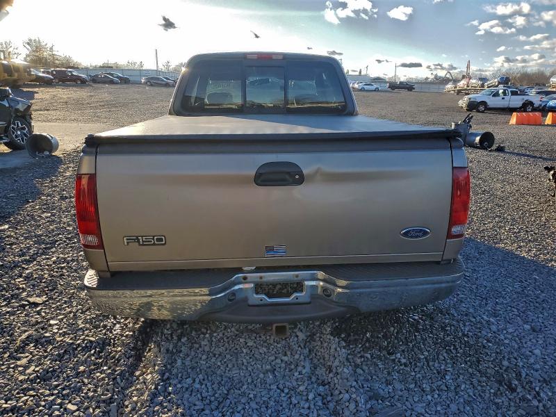 Photo 6 from auction – 2002 FORD F150 with VIN 1FTRX17W02NA79047