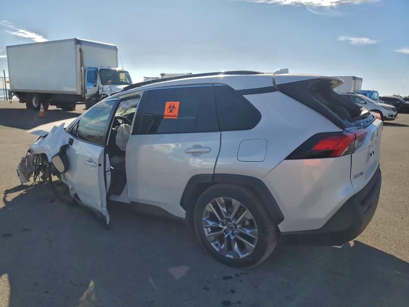 Photo 2 from auction – 2023 TOYOTA RAV4 with VIN JTMC1RFV5PD096549
