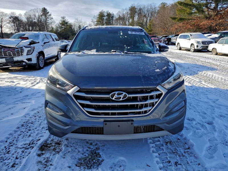 Photo 5 from auction – 2017 HYUNDAI TUCSON LIM with VIN KM8J3CA29HU498325