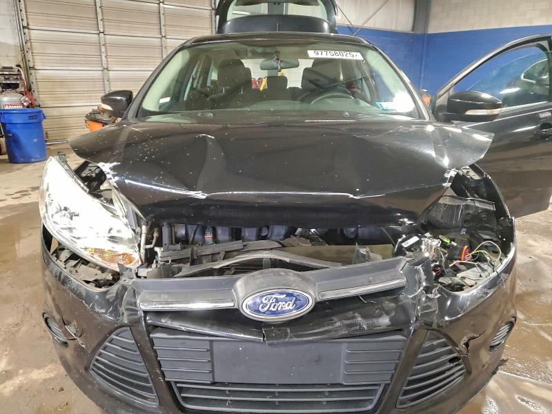 Foto 11 de la subasta – 2014 FORD FOCUS SE con VIN 1FADP3K27EL448731