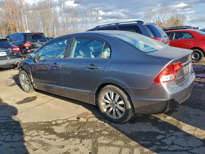 Photo 2 from auction – 2010 HONDA CIVIC EX with VIN 19XFA1F87AE087222