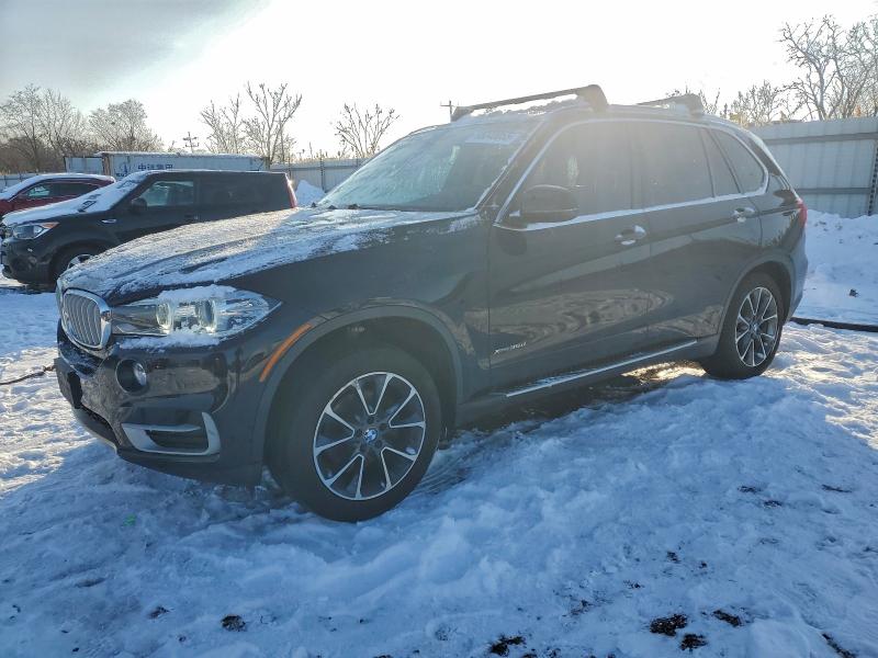 BMW X5 XDRIVE3 2015 with VIN 5UXKS4C59F0N05897 - Photo from auction