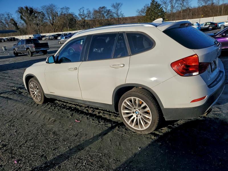 Photo 2 from auction – 2015 BMW X1 SDRIVE2 with VIN WBAVM1C50FVZ94228