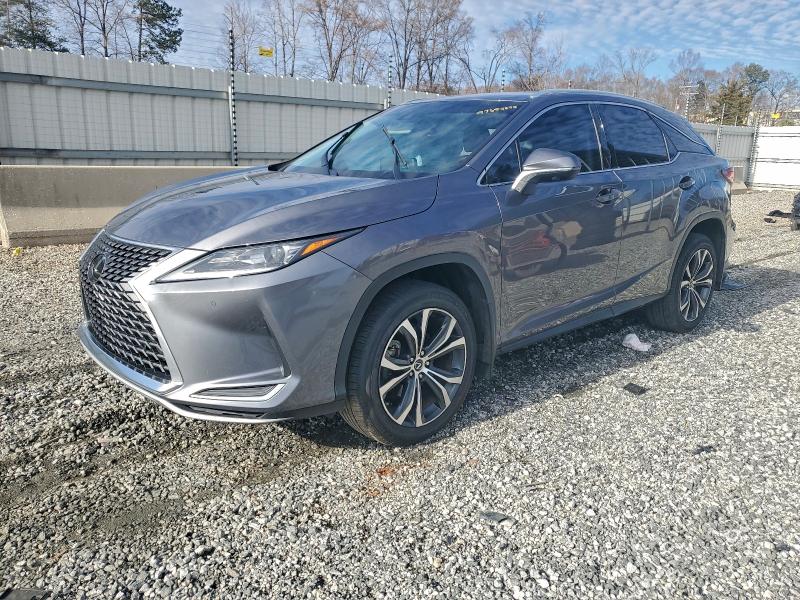LEXUS RX 2021 with VIN 2T2HZMAAXMC215142 - Photo from auction