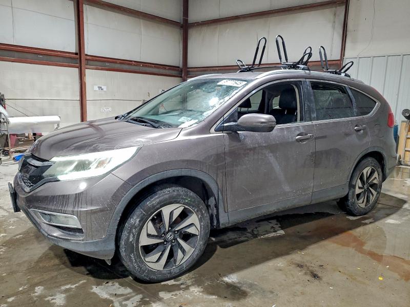 HONDA CR-V TOURI 2015 with VIN 5J6RM4H90FL077023 - Photo from auction
