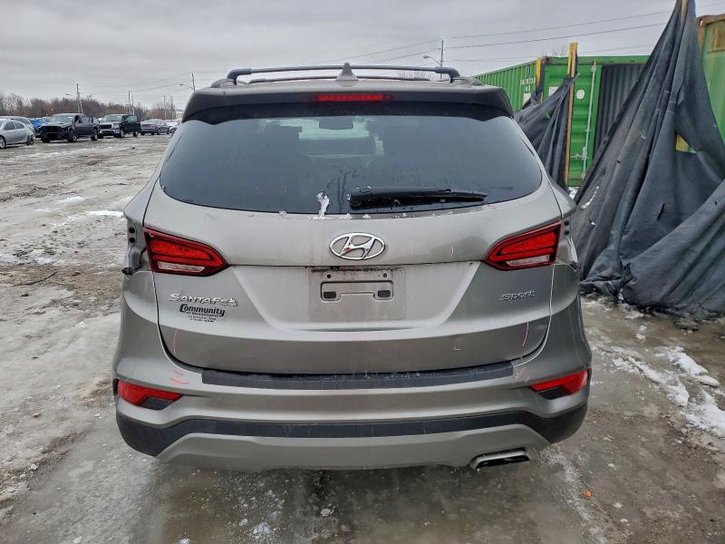Photo 6 from auction – 2017 HYUNDAI SANTA FE S with VIN 5NMZU3LB1HH013281