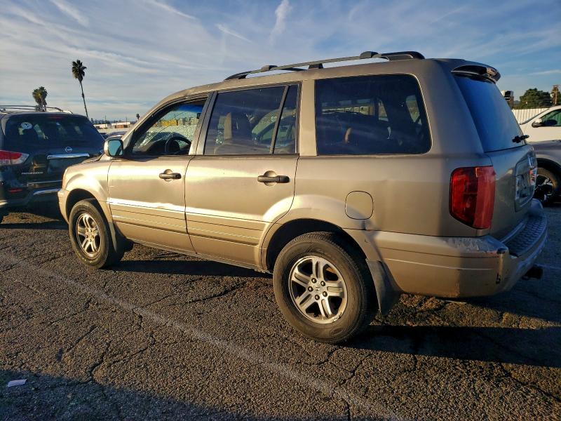 Фото 2 с аукциона – 2004 HONDA PILOT с VIN 2HKYF18594H612410