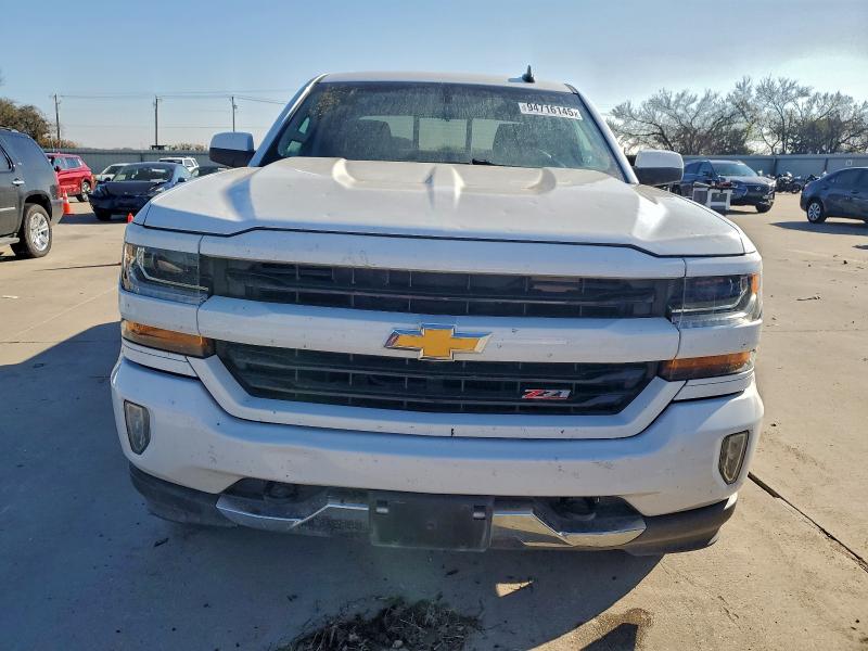 Photo 5 from auction – 2018 CHEVROLET SILVERADO with VIN 3GCUKREC1JG517971