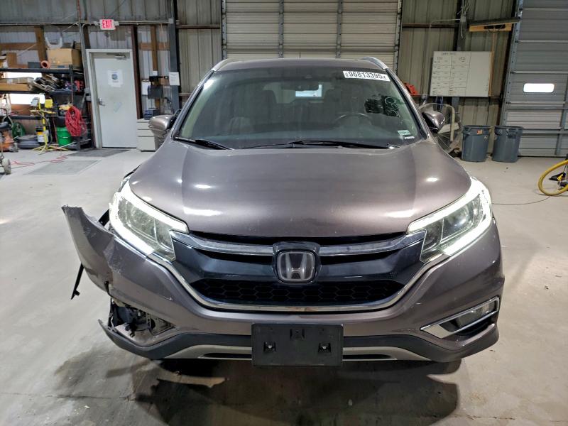 Photo 5 from auction – 2016 HONDA CR-V TOURI with VIN 5J6RM4H90GL081641