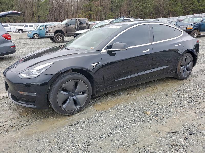 TESLA MODEL 3 2019 with VIN 5YJ3E1EAXKF409746 - Photo from auction