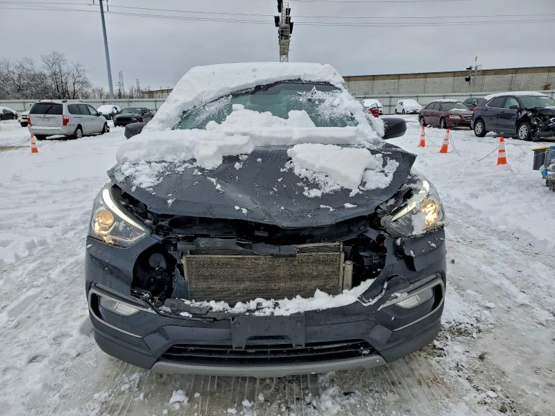 Photo 5 from auction – 2017 HYUNDAI SANTA FE S with VIN 5NMZU3LB9HH021399