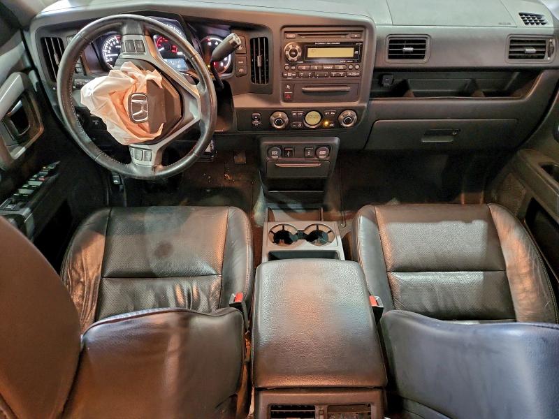 Photo 8 from auction – 2011 HONDA RIDGELINE with VIN 5FPYK1F54BB502995