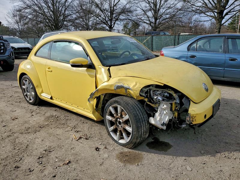 Photo 4 from auction – 2012 VOLKSWAGEN BEETLE with VIN 3VWJP7AT8CM604850