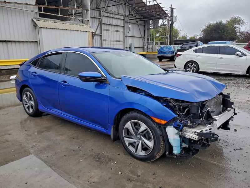 Photo 4 from auction – 2021 HONDA CIVIC LX with VIN 2HGFC2F6XMH533713
