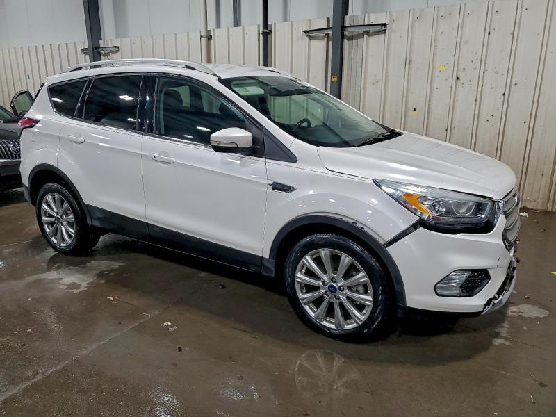 Photo 4 from auction – 2017 FORD ESCAPE TIT with VIN 1FMCU9J96HUD75667