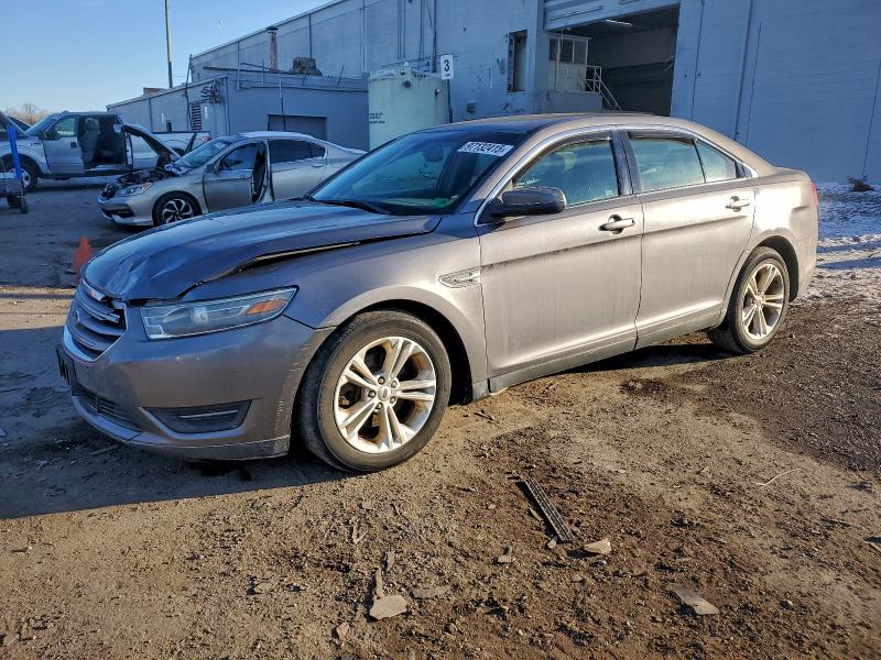 FORD TAURUS SEL 2014 with VIN 1FAHP2E80EG136612 - Photo from auction