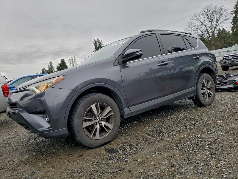 Photo 1 from auction – 2017 TOYOTA RAV4 XLE with VIN JTMRFREVXHD198573