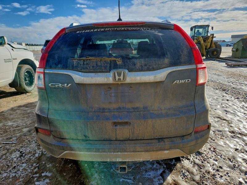 Photo 6 from auction – 2015 HONDA CR-V EXL with VIN 2HKRM4H74FH637571