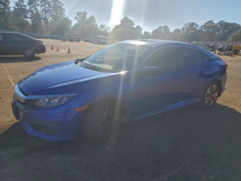 Photo 1 from auction – 2018 HONDA CIVIC EX with VIN JHMFC1F4XJX006705