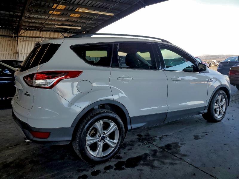 Photo 3 from auction – 2014 FORD ESCAPE SE with VIN 1FMCU0GX2EUD81432