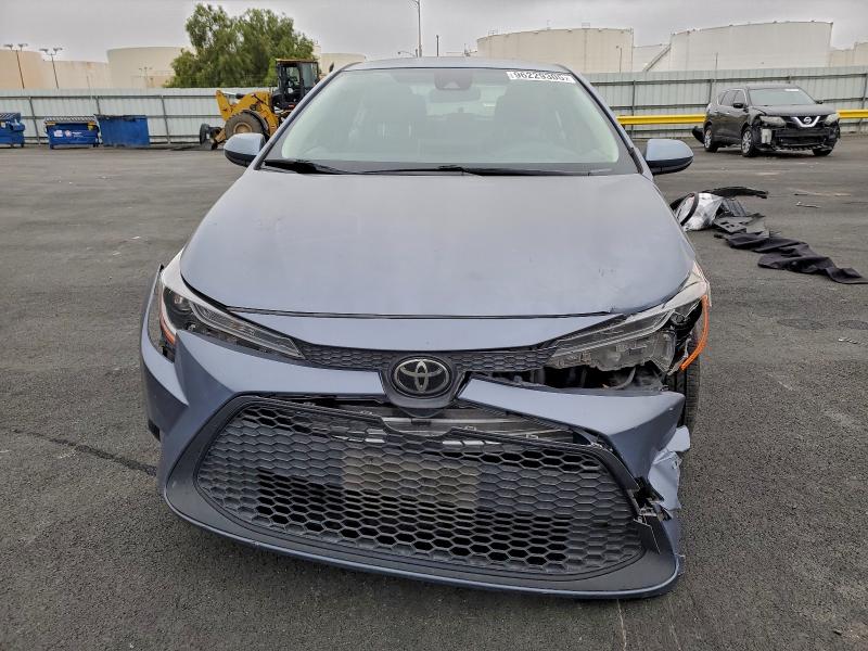 Photo 5 from auction – 2021 TOYOTA COROLLA LE with VIN JTDEPMAE6MJ140296