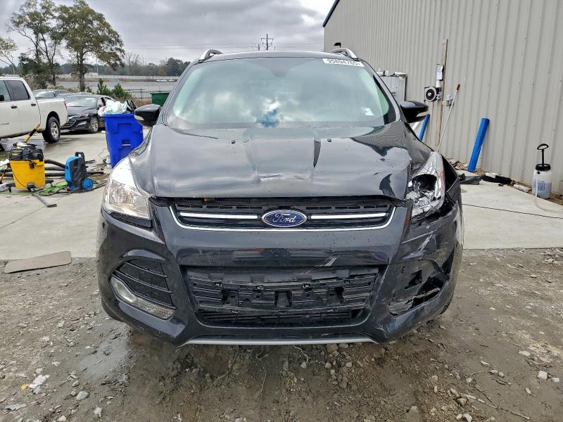 Photo 5 from auction – 2014 FORD ESCAPE TIT with VIN 1FMCU0J99EUB17490