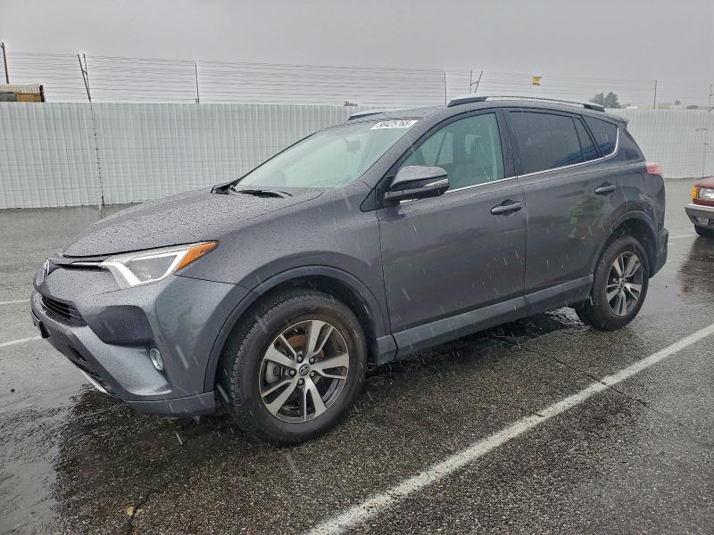 Photo 1 from auction – 2016 TOYOTA RAV4 XLE with VIN 2T3WFREV4GW290265