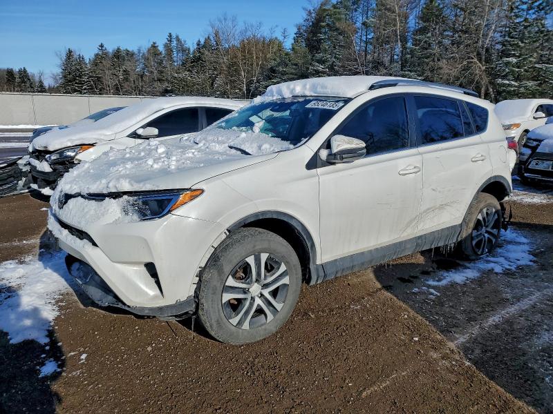 Photo 1 from auction – 2018 TOYOTA RAV4 LE with VIN 2T3ZFREV6JW406599