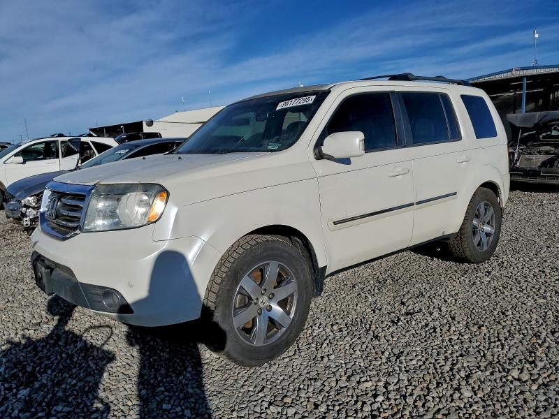 HONDA PILOT TOUR 2015 with VIN 5FNYF4H97FB073663 - Photo from auction