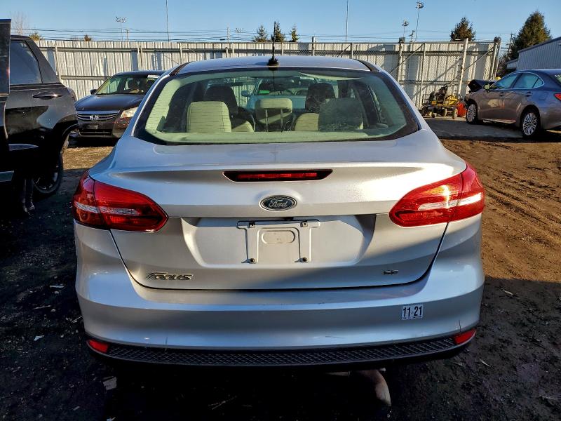 Photo 6 from auction – 2015 FORD FOCUS SE with VIN 1FADP3F24FL282793