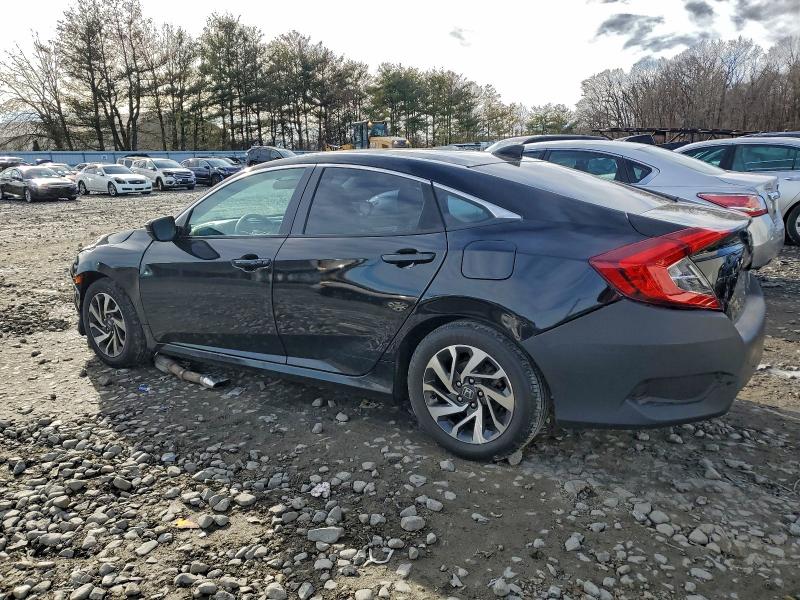 Photo 2 from auction – 2018 HONDA CIVIC EX with VIN 19XFC2F79JE201986