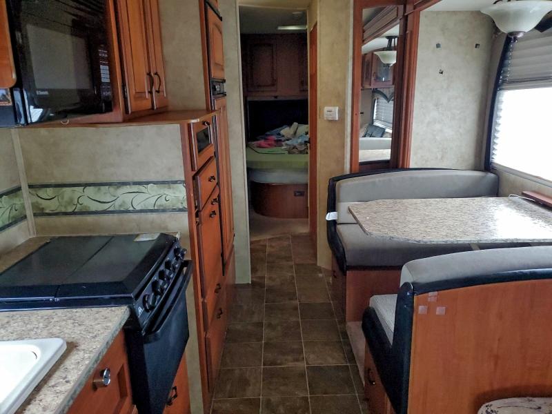 Photo 6 from auction – 2009 FORD ECONOLINE with VIN 1FDXE45S18DB09908