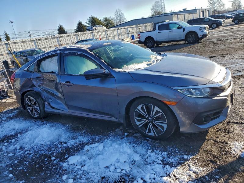 Zdjęcie 4 z aukcji – 2016 HONDA CIVIC EX z VIN 2HGFC1F34GH639739
