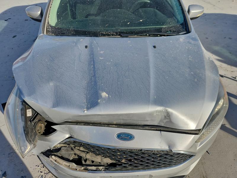 Photo 11 from auction – 2017 FORD FOCUS with VIN 1FADP3F22HL328575