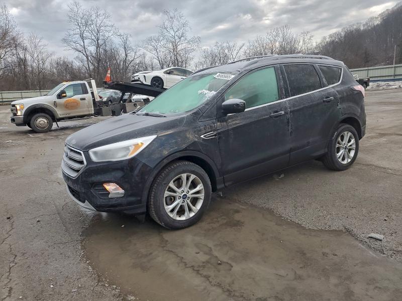 FORD ESCAPE SE 2017 with VIN 1FMCU9GD1HUC45842 - Photo from auction