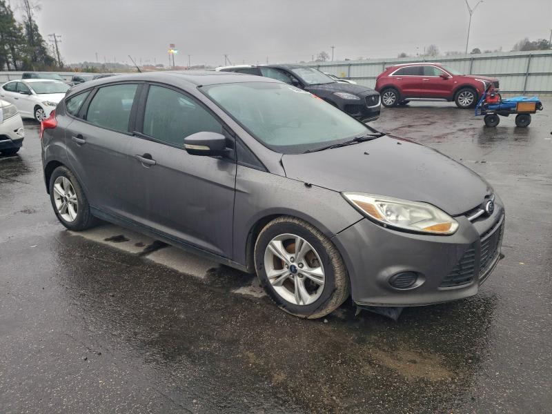 Foto 4 de la subasta – 2014 FORD FOCUS SE con VIN 1FADP3K22EL312863