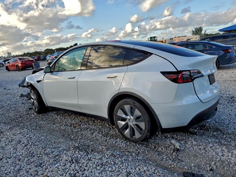 Photo 2 from auction – 2021 TESLA MODEL Y with VIN 5YJYGDED4MF109750