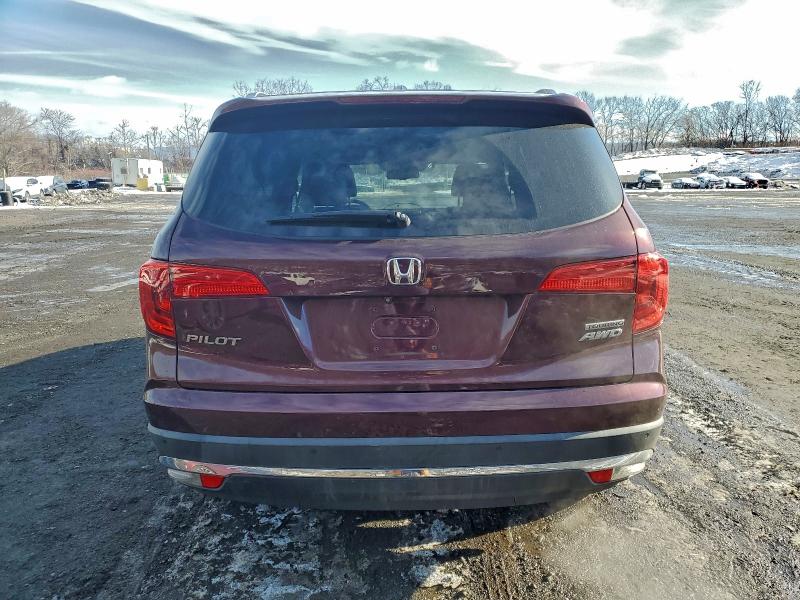 Photo 6 from auction – 2017 HONDA PILOT TOUR with VIN 5FNYF6H96HB007880