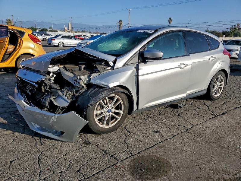 FORD FOCUS SE 2018 with VIN 1FADP3K27JL211411 - Photo from auction