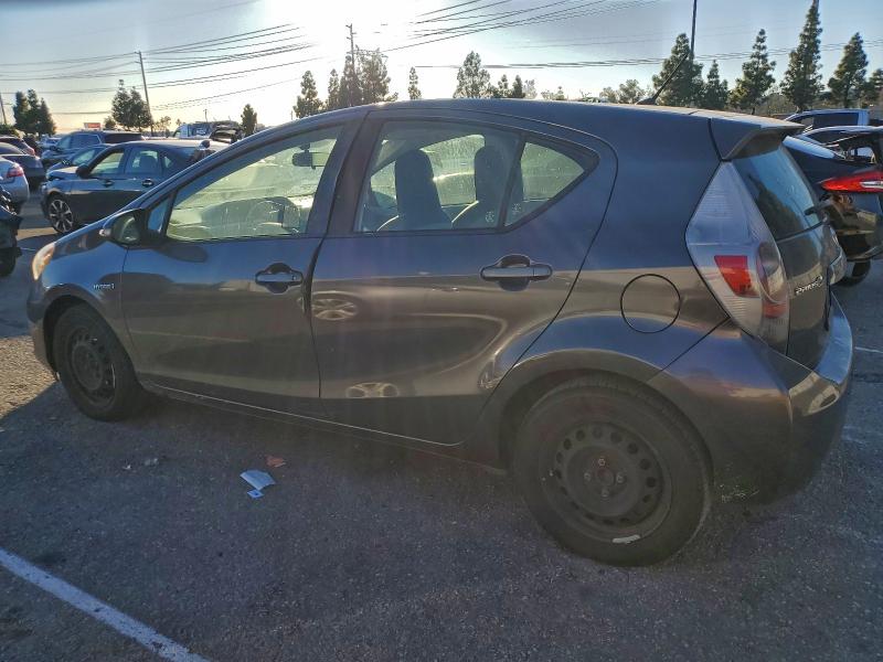Photo 2 from auction – 2014 TOYOTA PRIUS C with VIN JTDKDTB38E1568486