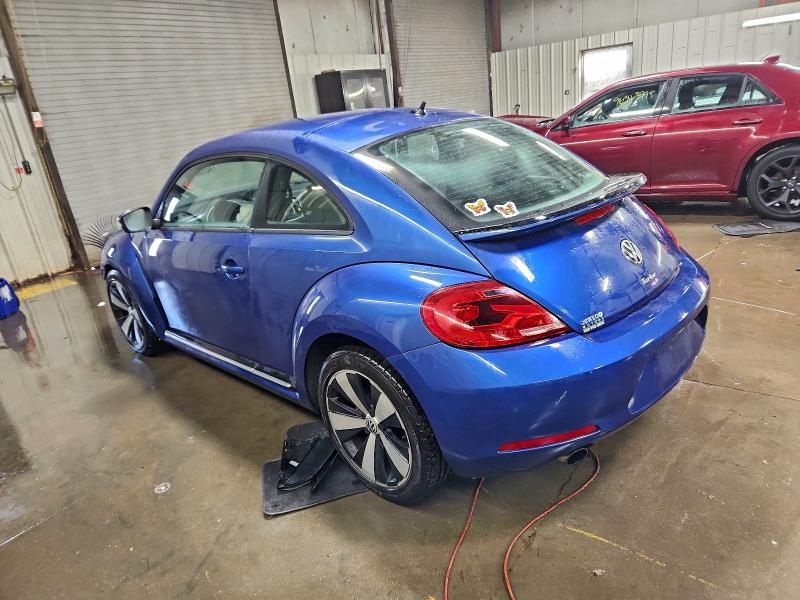 Photo 2 from auction – 2012 VOLKSWAGEN BEETLE TUR with VIN 3VWVA7AT7CM650981