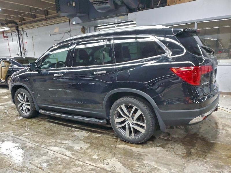 Photo 2 from auction – 2017 HONDA PILOT TOUR with VIN 5FNYF6H98HB081401