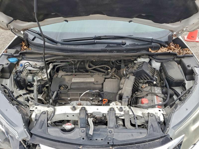 Photo 12 from auction – 2015 HONDA CR-V LX with VIN 5J6RM3H31FL013658