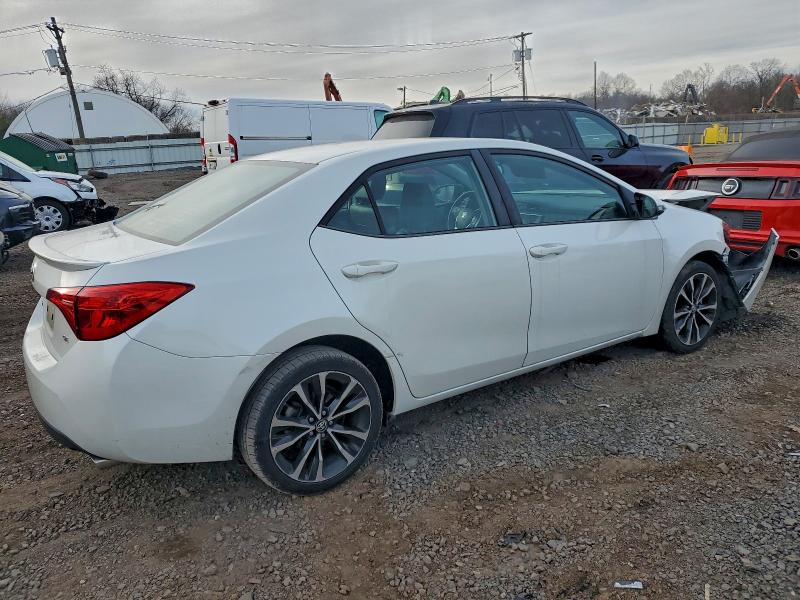 Photo 3 from auction – 2018 TOYOTA COROLLA L with VIN 5YFBURHE5JP772552