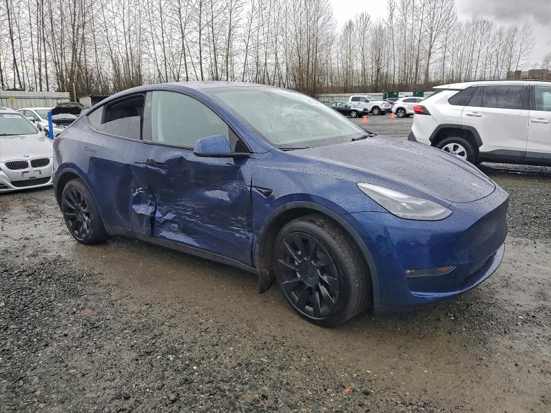 Photo 4 from auction – 2023 TESLA MODEL Y with VIN 7SAYGAEE5PF855235