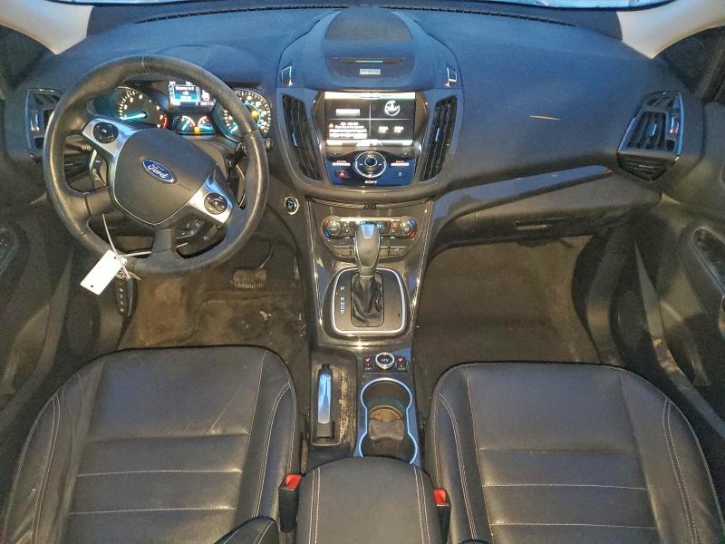 Photo 8 from auction – 2014 FORD ESCAPE TIT with VIN 1FMCU9J9XEUB13503